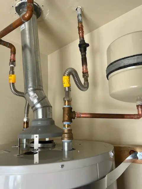 Water heater installation and plumbing repair in Pinewood